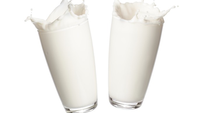 Two glasses full of milk