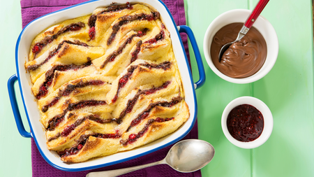 Baked bread and butter sandwiched with thick chocolate spread