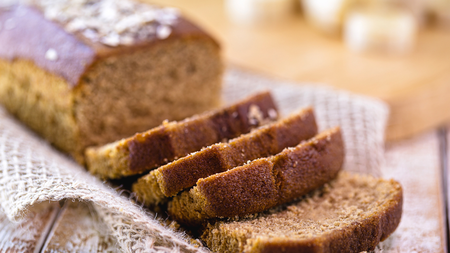 A thickly sliced golden loaf of bread made with veggies 