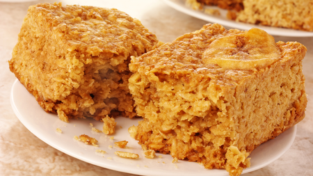 rich golden squares of flapjack topped with baked slices of banana