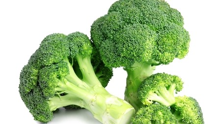 Three fresh heads of broccolli